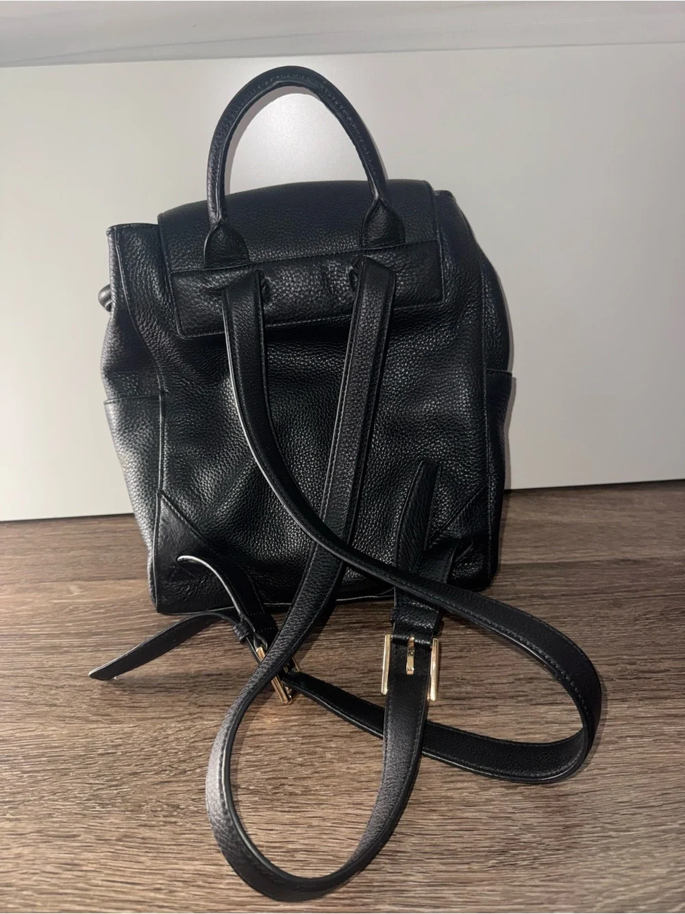Black Leather Backpack with Gold Logo